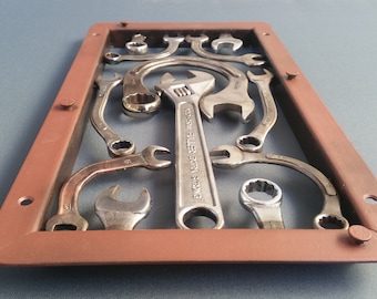 Hand formed old wrench metal panel.   One of a kind made in my studio / shop.