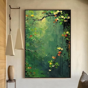 May include: An abstract painting of a verdant forest scene in a black frame. The artwork features a variety of colours, including green, yellow, and red, with a focus on the natural beauty of the forest. The painting is a vertical rectangle.