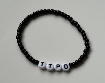 Bracelet mots d'amitié en perles Taylor Swift. Chansons de poètes torturés Choisissez une version prédéfinie ou choisissez un bracelet de mots personnalisé, personnalisé pour vous.
