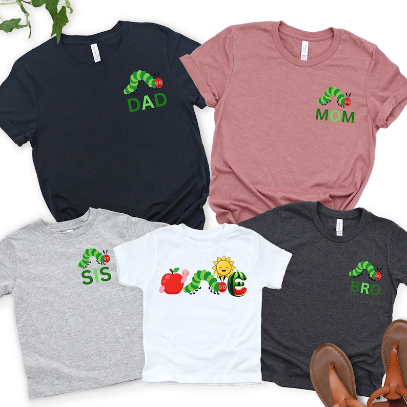 a group of three t - shirts sitting next to each other