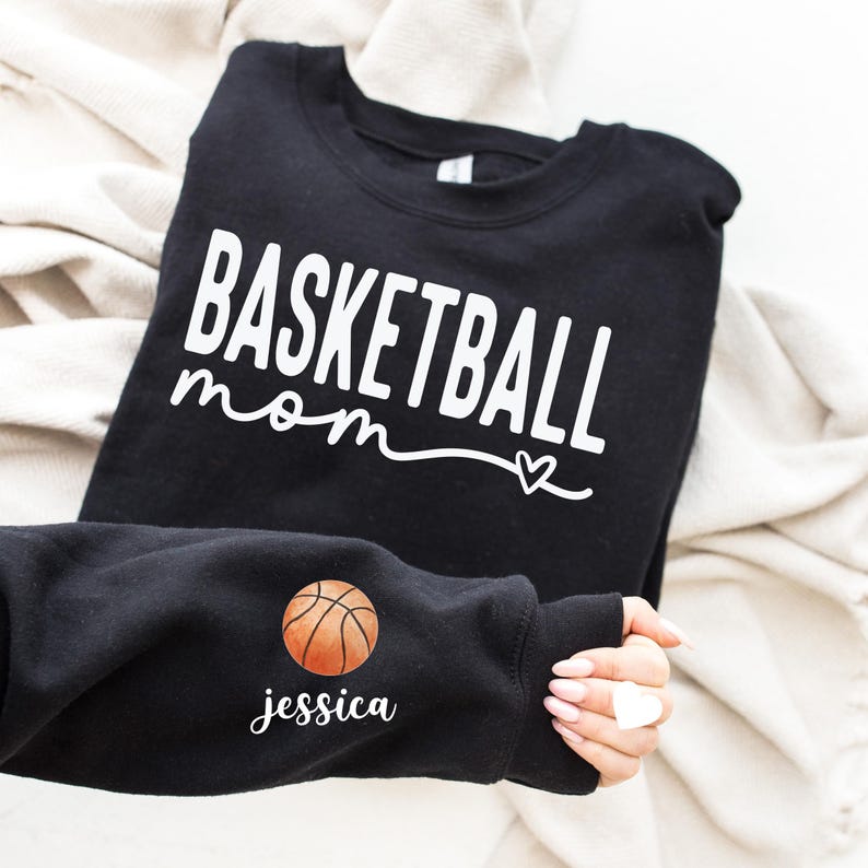 a black shirt with a basketball mom on it