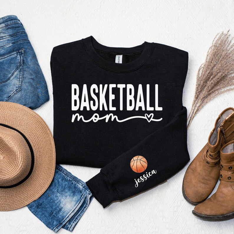 a black shirt with a basketball mom on it