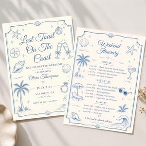 May include: Two cream-coloured rectangular cards with blue ink illustrations and text. The left card reads Last Toast On The Coast, Bachelorette Weekend, Olivia Thompson, July 8-10, San Diego, CA, RSVP at 123-456-7890. The right card reads Weekend Itinerary.