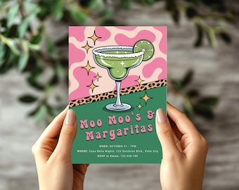 May include: A party invitation card featuring a margarita glass with a lime slice, surrounded by stars. The background has a pink cow print design. The text reads "Moo Moo's & Margaritas". The invitation is held by hands.