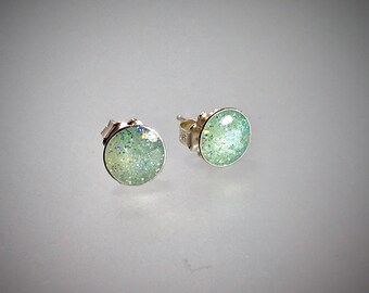 Sterling silver bauble stud earrings in mint green resin.