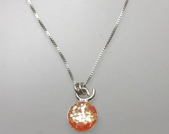 Tiny sterling silver large orange glitter resin necklace