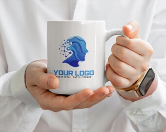May include: White ceramic mug with a blue and white logo that says "YOUR LOGO" and "ARTIFICIAL INTELLIGENCE". The logo features a stylised blue head with a wave pattern.