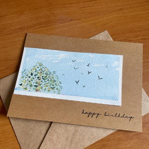 Tarjeta de felicitación única hecha a mano con acuarela y tinta, en blanco para su propio mensaje.