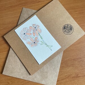 Tarjeta de felicitación única hecha a mano con acuarela y tinta, en blanco para su propio mensaje.