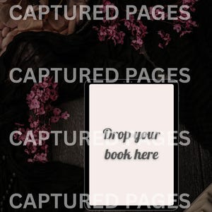 May include: A digital tablet with the text "Drop your book here" on the screen, surrounded by dark fabric, pink flowers, and a lit candle. The words "CAPTURED PAGES" are overlaid on the image.