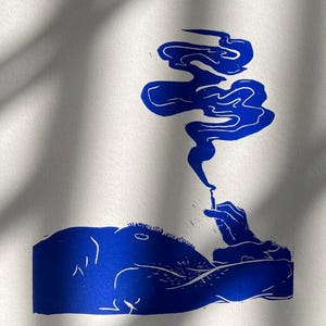 May include: A blue silhouette of a person lying down with a cigarette in their hand, smoke rising above them.