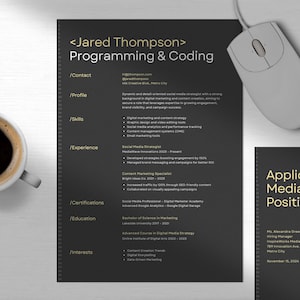 May include: A dark grey resume and cover letter on a white surface, with a coffee cup and a computer mouse. The resume includes the name "Jared Thompson" and the title "Programming & Coding". The cover letter is on the right. The resume has white text.