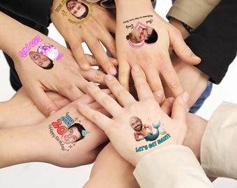 May include: Four hands stacked together, each featuring a unique temporary tattoo. Designs include a face with text 'The Lucky Guy', a couple with 'Jack Emily', a face with 'Disco Party', 'This Guy's 20', and a merman graphic with 'Let's Get Nauti'.