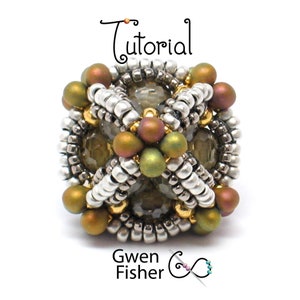 May include: A beaded sphere with a geometric design, featuring silver, gold, and green beads. The sphere is a jewelry component, possibly a pendant or charm.