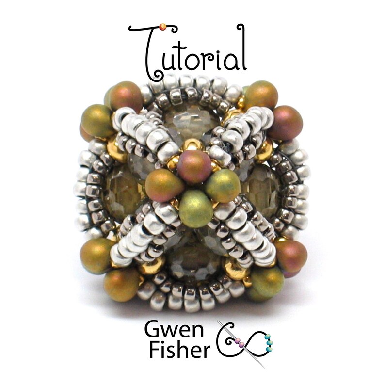 May include: A beaded sphere with a geometric design, featuring silver, gold, and green beads. The sphere is a jewelry component, possibly a pendant or charm.