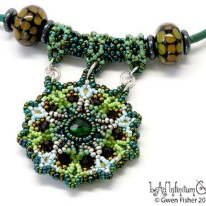 May include: A green, brown, and silver beaded necklace with a large, intricate, beaded pendant. The pendant features a green gemstone in the center and is surrounded by smaller beads in various shades of green, brown, and silver.