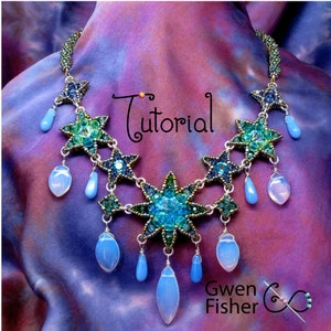 May include: A beaded necklace with a starburst design in shades of blue and green. The necklace features a central starburst with smaller starbursts on either side. The necklace is accented with teardrop-shaped beads in a light blue color. The necklace is labeled "Tutorial" and "Gwen Fisher".