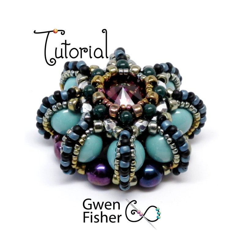 May include: A beaded flower with a turquoise, green, gold, and purple color scheme. The center of the flower features a large, faceted, dark purple gemstone.
