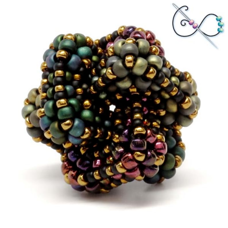 May include: A handcrafted beaded ring featuring a complex, three-dimensional design. The ring showcases a mix of dark green, purple, and gold beads, creating a textured, eye-catching piece. The design includes a diagram of the beading process.