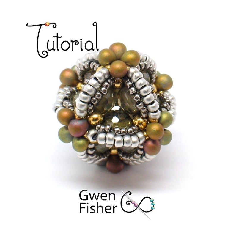 May include: A beaded sphere with a geometric design, featuring silver, gold, and green beads. The sphere is approximately 1 inch in diameter.