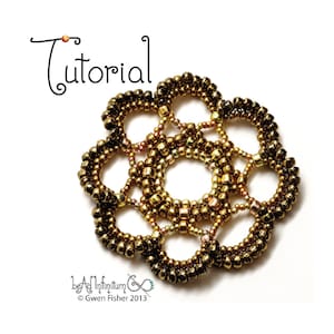 May include: A gold and brown beaded flower-shaped design with a central hole. The design is made of multiple circles of beads, creating a delicate and intricate pattern.