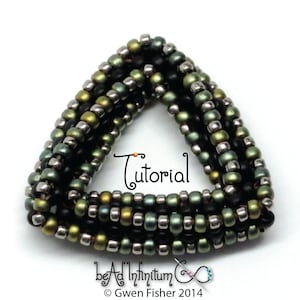 May include: A close-up of a triangular beaded jewelry piece made with black, silver, and green beads. The piece is a tutorial for a beaded project. The text "Tutorial" is written in cursive on the image.