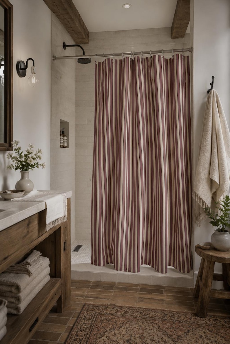 Classic pinstripe shower curtain with burgundy and neutral cream stripes, modern bathroom style