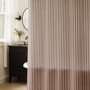 Modern vintage striped shower curtain in burgundy and beige for neutral bathrooms