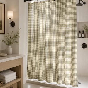 Cottagecore bathroom with green and white checkered shower curtain