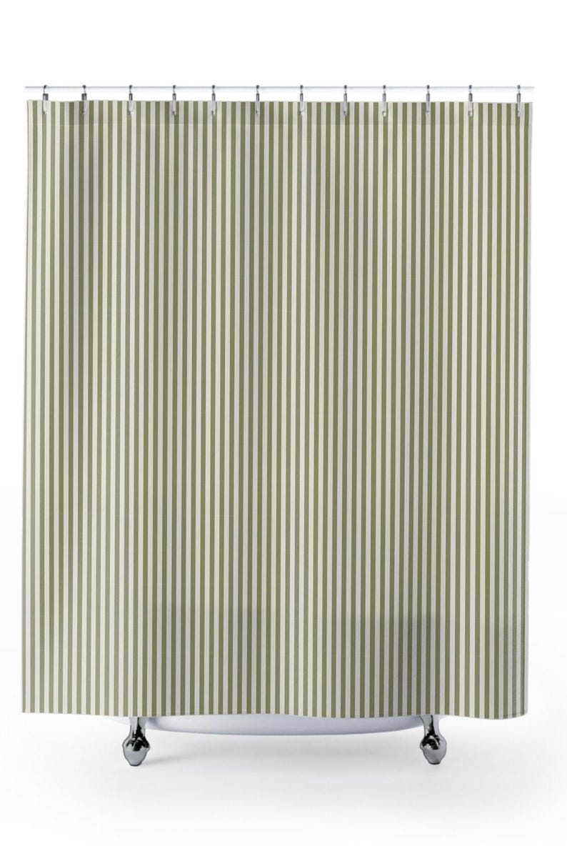 Sage green striped shower curtain in modern farmhouse bathroom