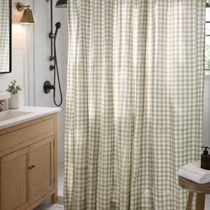 Olive green gingham shower curtain in farmhouse bathroom