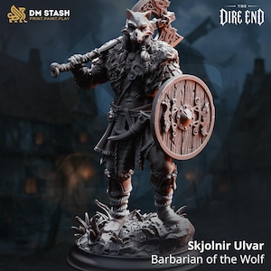 May include: A gray miniature figurine of a warrior wearing a wolf head mask, fur-lined armor, and leg wraps. The figure holds a large battle axe over one shoulder and carries a round wooden shield with metal accents, standing on a rocky base.
