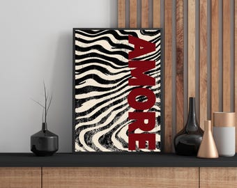 Può includere: Una stampa artistica da parete rettangolare incorniciata con un motivo ondulato e marmorizzato nero e crema sul lato sinistro e la parola AMORE stampata in grassetto, in lettere maiuscole rosso scuro verticalmente a destra.