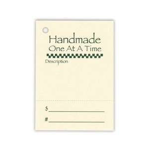May include: A blank, cream-colored gift tag with a hole punched in the top. The tag has the text "Handmade One At A Time" in green lettering with a black and white checkered line below. The tag also has the word "Description" printed below the checkered line. There are two blank lines at the bottom of the tag for writing a price and quantity.