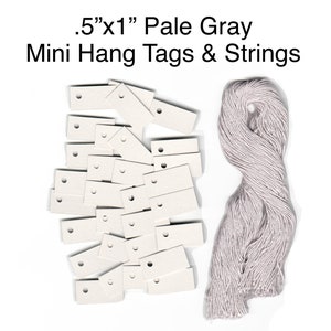 100 diminutas mini blank etiquetas colgantes gris pálido. Tamaño 1/2 &quot;x 1&quot;,Cartulina,Etiquetas de joyería,Elección de cadenas de color,Etiquetas de precio,Etiquetas de producto,Etiquetas en blanco