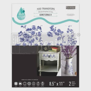 May include: A package of H2O Transfers with the text "Azure Florals II". The package features a floral design in shades of blue and white. The package is 8.5" x 11" and includes 2 sheets. The transfers work on various surfaces.