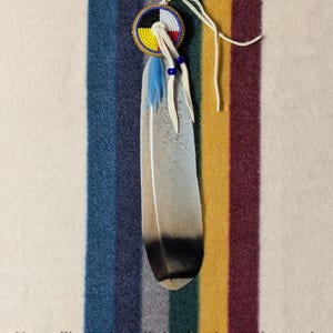 V120 - Verzierter Schwanzfeder