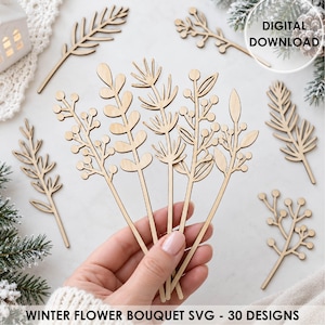 May include: A collection of light-colored wooden plant and floral cutouts featuring various botanical shapes like sprigs, berries, and leaves. The text DIGITAL DOWNLOAD and WINTER FLOWER BOUQUET SVG - 30 DESIGNS is visible on the image.