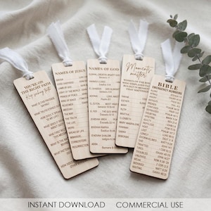 May include: Wooden bookmarks with white ribbon ties. Each bookmark features text in a different font. The bookmarks have phrases like "Names of Jesus", "Names of God", and "Bible Emergency Numbers". The bookmarks are made of light-colored wood.