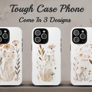 May include: Three white phone cases with different designs featuring cute cats and floral patterns. The text "Tough Case Phone Come In 3 Designs" is displayed above the cases.