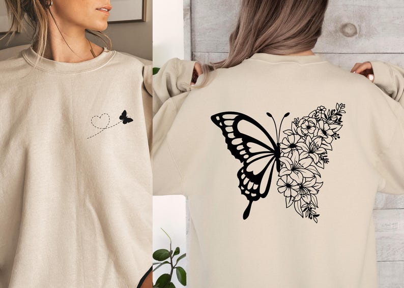 a woman wearing a sweatshirt with a butterfly on it