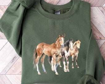 Sudadera Western Horses: estilo vaquera rústico y acogedor, unisex, tallas S-XL.