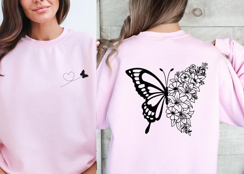 a woman wearing a pink shirt with a butterfly and flowers on it