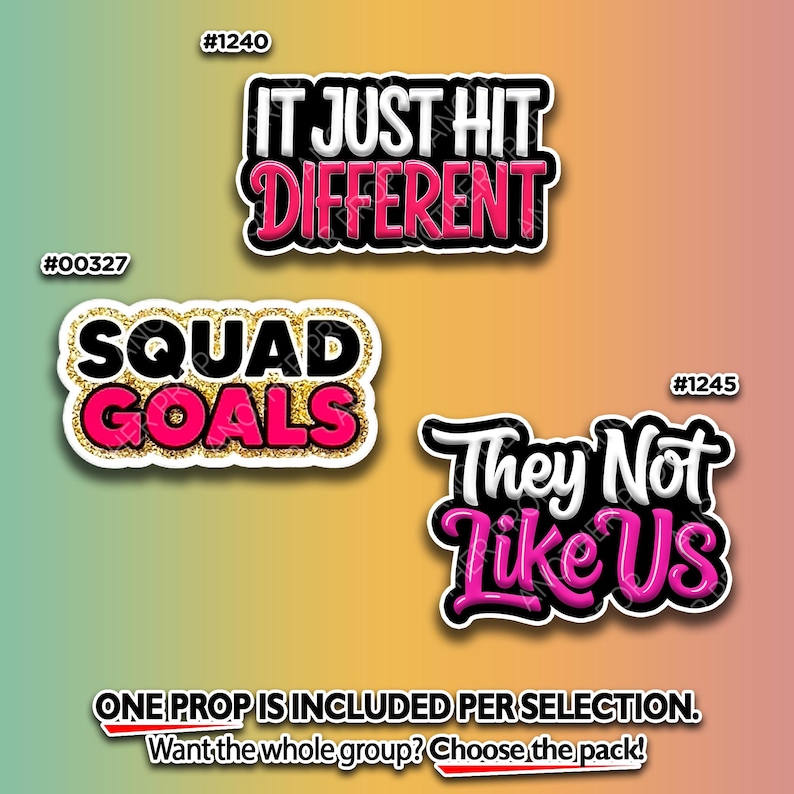 May include: Three sticker props with text. The top sticker says "IT JUST HIT DIFFERENT" in white and pink. The middle sticker says "SQUAD GOALS" in pink and gold. The bottom sticker says "They Not Like Us" in white and pink.