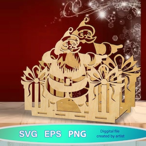 May include: A wooden Christmas decoration with a laser-cut Santa Claus design. The Santa figure is in front of a gift box with bows. The background is a gradient of red and white. The bottom of the image has the text "SVG EPS PNG".