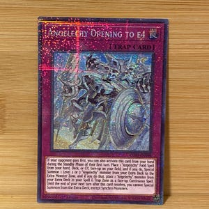 May include: A holographic trading card titled Angelechy Opening to E4, featuring a purple border and a central illustration of a metallic armored figure holding a spear and shield. The card includes detailed text describing game mechanics.