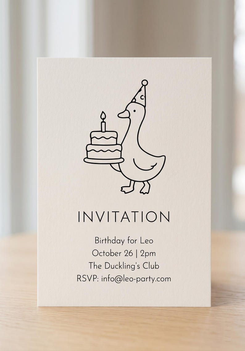 May include: A cream-colored birthday invitation card featuring a line drawing of a duck wearing a party hat and holding a cake. The text "INVITATION" is at the top, with details for Leo's birthday: October 26, 2 PM, at The Duckling's Club.