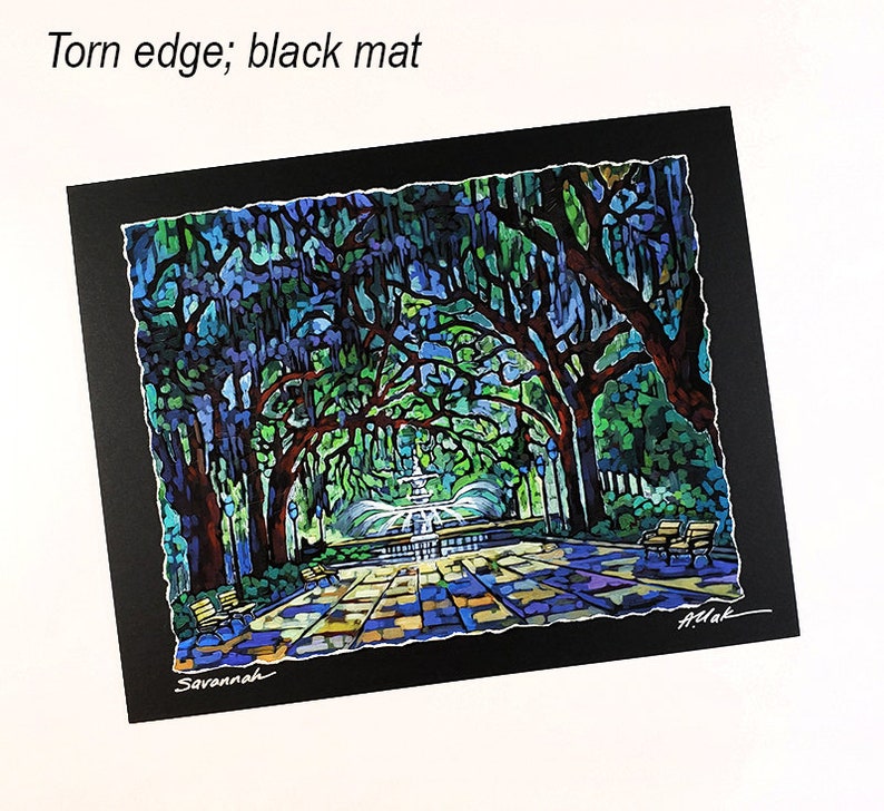 May include: A colorful painting of a park scene with a fountain, benches, and trees. The artwork is set on a black mat with a torn edge. The word "Savannah" is written at the bottom.