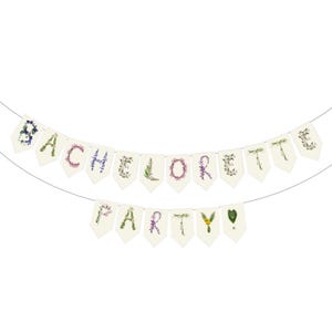 Custom floral paper banner spelling "BACHELORETTE PARTY" in delicate pink, sage green, and cream botanical letters. Personalized party decoration featuring pressed flower and leaf designs, perfect for bachelorette parties, bridal celebrations, and girls' weekend getaways. Elegant nature-inspired garland.