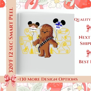 May include: A white heat transfer vinyl sheet featuring a brown Chewbacca character holding two balloons shaped like Mickey Mouse ears, one resembling Princess Leia and the other R2-D2, with a yellow Star Wars logo outline in the background.